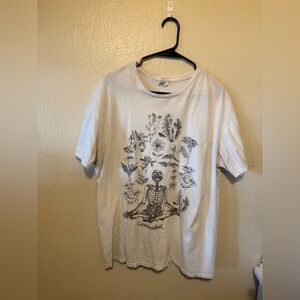 Grounded Skeleton 💀 White Graphic T-Shirt with Botanical Design